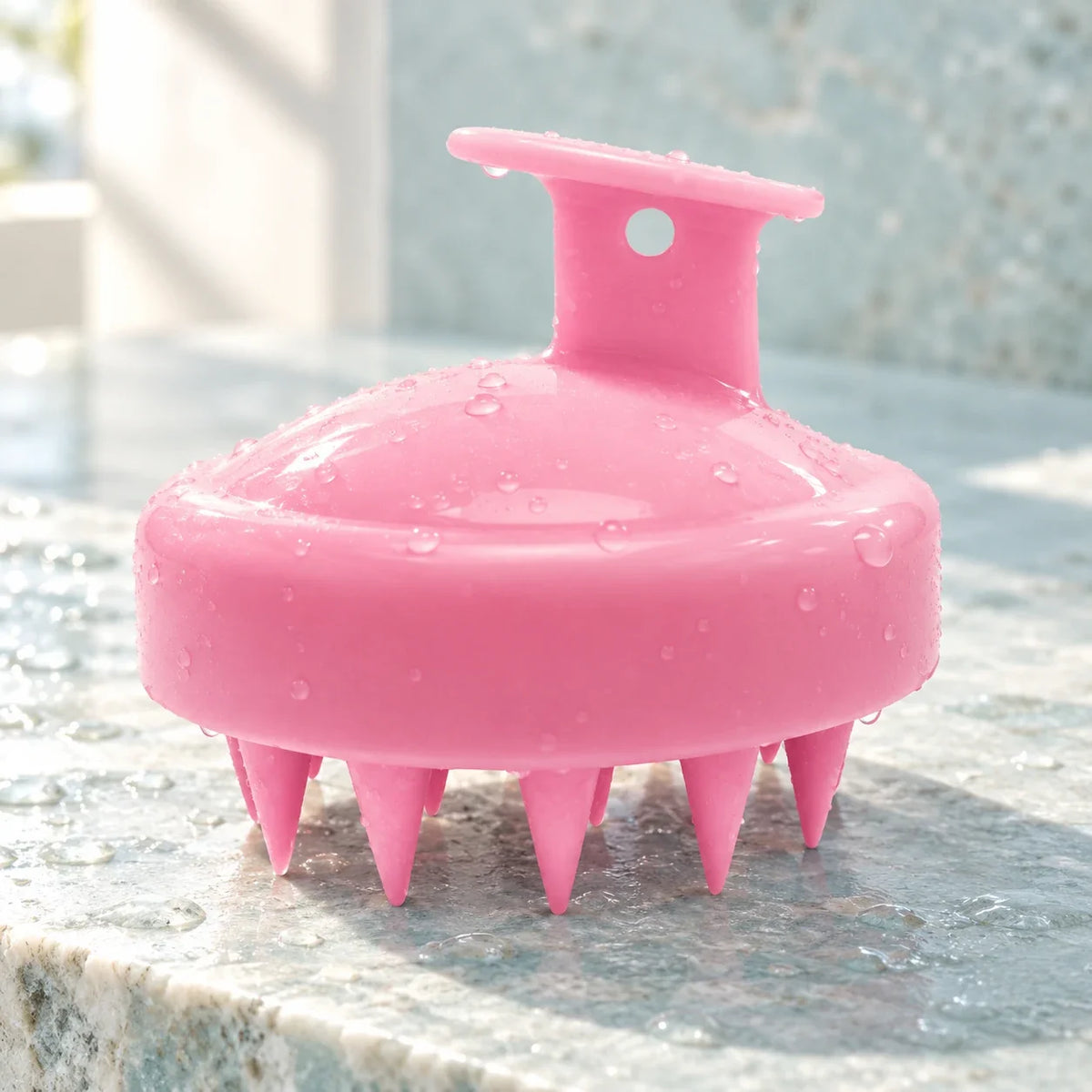 One pink palm scalp brush in a styled wash-day scene