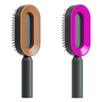 Air-cushion hairbrush — Set O; 2 air-cushion brushes: 1 black-and-gold + 1 black-and-purple