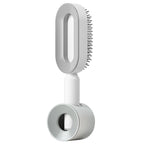 Air-cushion hairbrush — Elegant white Set; 1 white air-cushion brush + 1 white base
