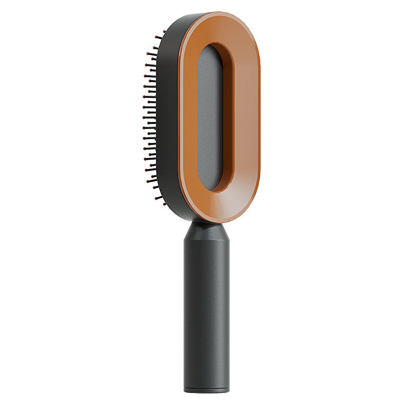 Air-cushion hairbrush — Black gold; 1 black-and-gold air-cushion brush