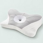 Contoured foam pillow — representative option in a coastal studio setting; choose options for exact contents.
