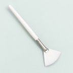 Fan applicator brush — representative option in a coastal studio setting; choose options for exact contents.