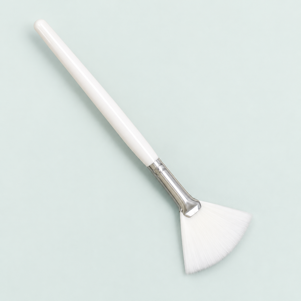 Fan applicator brush — representative option in a coastal studio setting; choose options for exact contents.