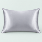 Satin-feel everyday pillowcase — representative option in a coastal studio setting; choose options for exact contents.