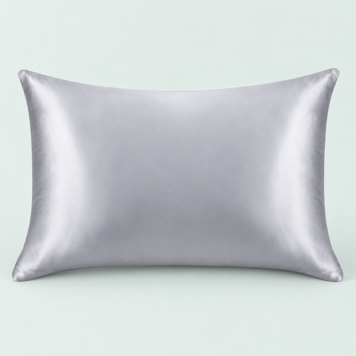 Satin-feel everyday pillowcase — representative option in a coastal studio setting; choose options for exact contents.