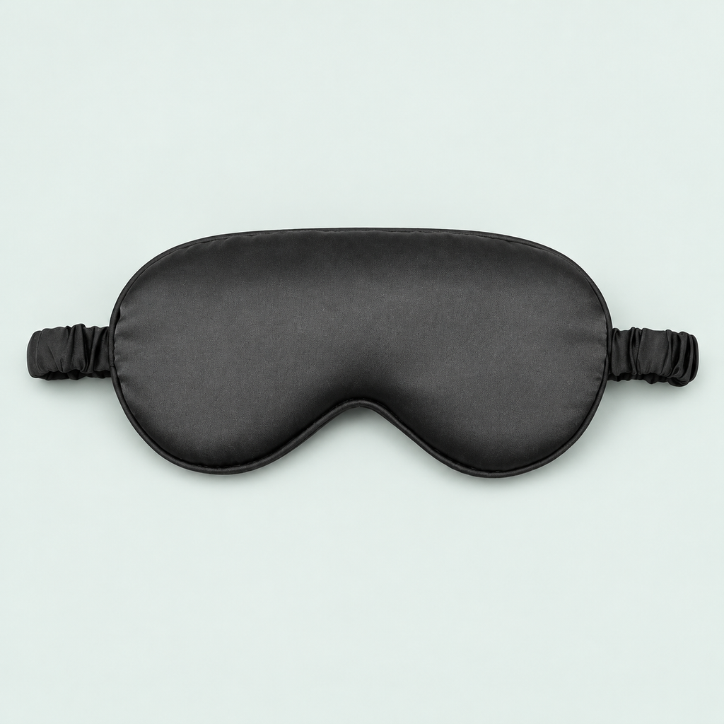 Satin-feel eye mask — representative option in a coastal studio setting; choose options for exact contents.
