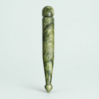 Smooth stone massage tool — representative option in a coastal studio setting; choose options for exact contents.